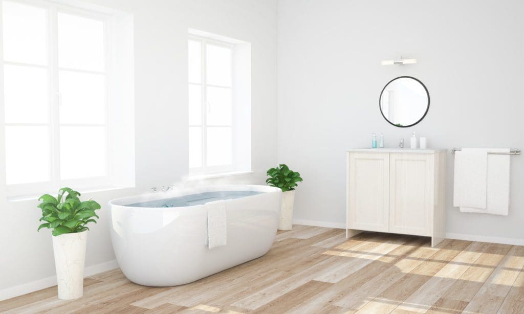 Bathroom remodel with new floors, soaking tub, and new vanity completed by Kitchen Top Shop